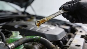 coolant in engine oil mechanic dipstick