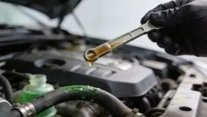 coolant in engine oil mechanic dipstick